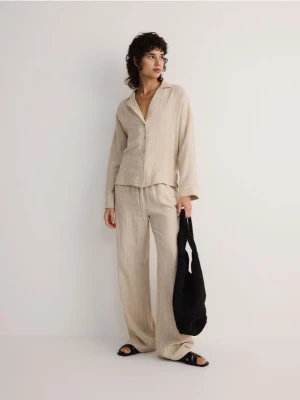 Reserved - Spodnie z wiskozą i lnem - beżowy