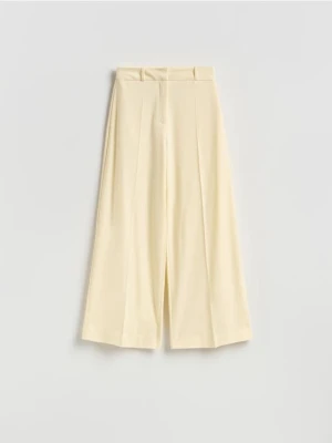 Reserved - Spodnie z wiskozą - jasnożółty