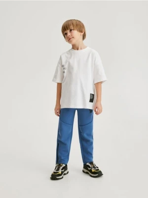 Reserved - Sportowe joggery z zamkami - granatowy