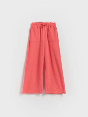Reserved - Strukturalne spodnie z kieszeniami - koralowy