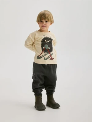 Reserved - Strukturalny longsleeve Muminki - złamana biel