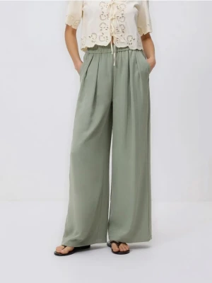 Reserved - Szerokie spodnie - ciemnozielony