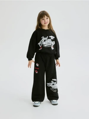 Zdjęcie produktu Reserved - Szerokie spodnie dresowe Hello Kitty - czarny
