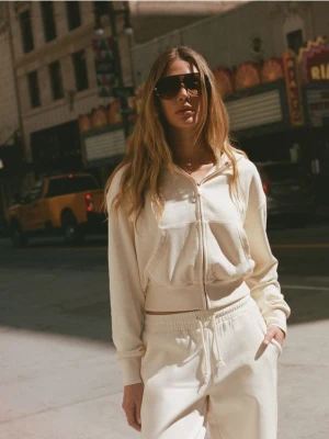 Reserved - Szerokie spodnie dresowe - jasnożółty