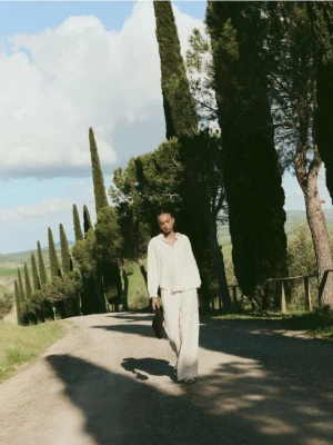 Reserved - Szerokie spodnie z dodatkiem lnu - beżowy