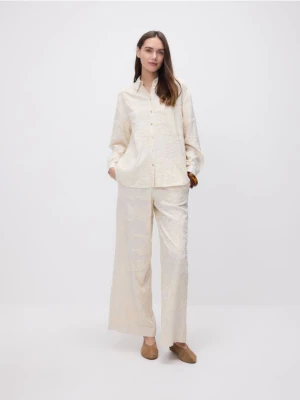 Reserved - Szerokie spodnie z dodatkiem lnu - beżowy