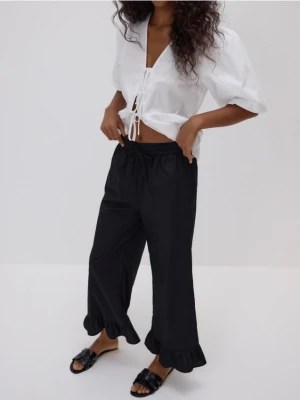 Reserved - Szerokie spodnie z falbankami - czarny