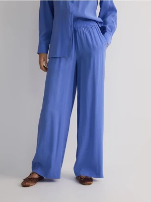 Reserved - Szerokie spodnie z modalu - jasnoniebieski