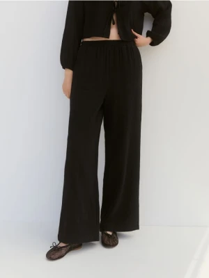 Zdjęcie produktu Reserved - Szerokie spodnie z muślinu - czarny