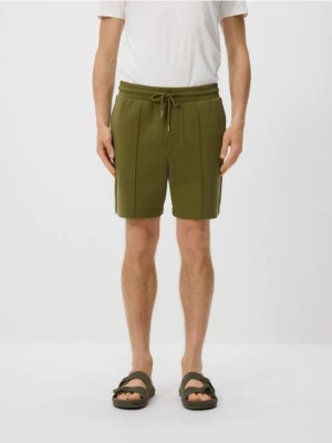 Reserved - Szorty comfort z przeszyciami - jasny zielony