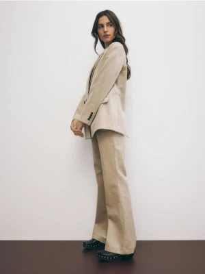 Reserved - Sztruksowe spodnie flare - beżowy