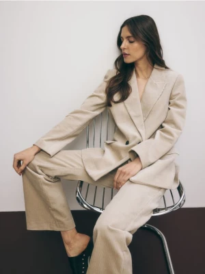 Reserved - Sztruksowe spodnie flare - beżowy