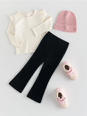 Reserved - Sztruksowe spodnie flare - czarny