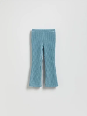 Reserved - Sztruksowe spodnie flare - jasnoturkusowy