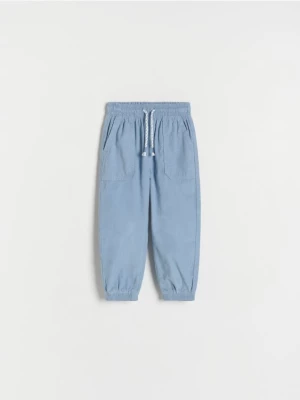 Reserved - Sztruksowe spodnie jogger - niebieski