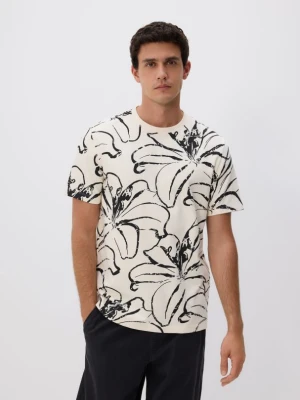 Reserved - T-shirt regular z nadrukiem allover - złamana biel