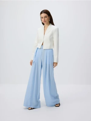 Reserved - Wiskozowe spodnie z paskiem - jasnoniebieski