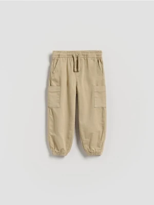 Reserved - Wysokoelastyczne joggery cargo - beżowy
