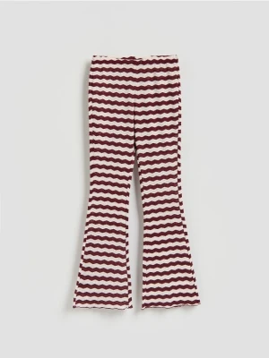 Reserved - Wzorzyste spodnie flare - bordowy