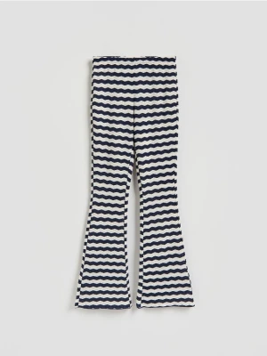 Reserved - Wzorzyste spodnie flare - granatowy