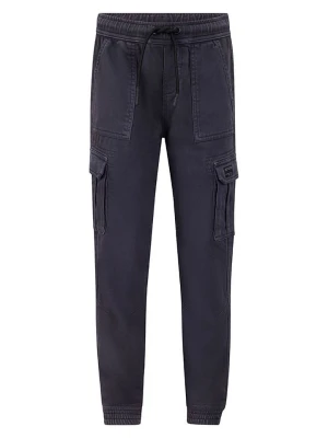 Retour Spodnie dresowe "Roan" w kolorze granatowym rozmiar: 170/176