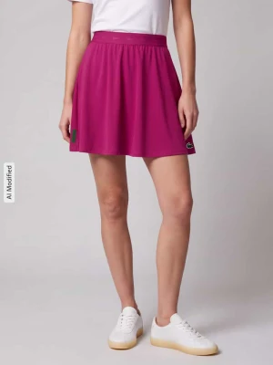 Rozkloszowana sportowa spódnica z detal z logo Lacoste Mocnoróżowy