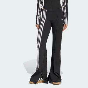 Rozkloszowane spodnie z przesuniętymi 3 paskami Adidas