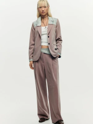 Różowe spodnie z materiałów z recyklingu Desigual