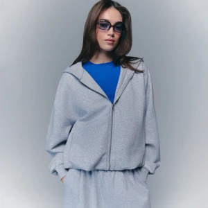 Rozpinana bluza typu bombka z kapturem basic szara House