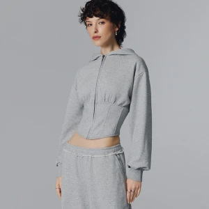 Rozpinana bluza z kapturem i gorsetowymi wstawkami szara House