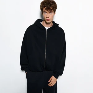 Rozpinana czarna bluza bombka z kapturem House