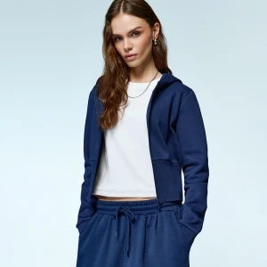 Rozpinana granatowa bluza z szerokim ściągaczem na dole House