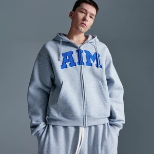 Rozpinana jasnoszara bluza z kapturem i naszywką AIM House