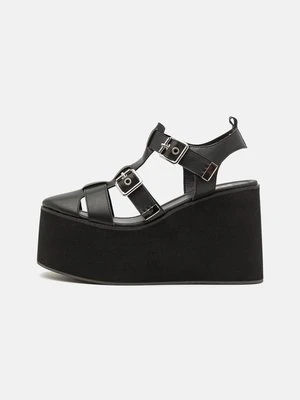 Zdjęcie produktu Sandały na koturnie Koi Footwear