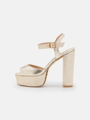 Sandały na platformie Stuart Weitzman złoty