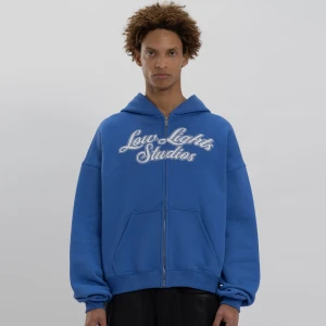 Zdjęcie produktu Shutter Zip Hoodie, markiLow Lights Studios, Bluzy, w kolorze niebieski, rozmiar: