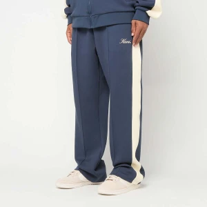 Sidestripe Trackpants Karl Kani niebieski