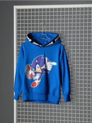 Sinsay - Bawełniana bluza z kapturem Sonic the Hedgehog - niebieski