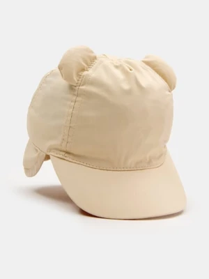 Sinsay - Bawełniana czapka z daszkiem, osłoną karku i uszkami 3D - kremowy