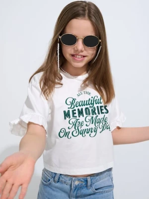 Sinsay - Bawełniana koszulka z napisem i ozdobnymi falbanami - kremowy