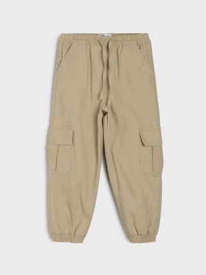 Sinsay - Bawełniane jeansy jogger cargo comfort - beżowy