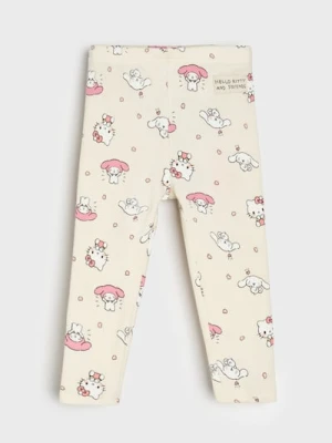 Sinsay - Bawełniane legginsy ze wzorem Hello Kitty - kremowy