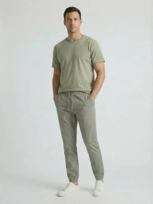 Sinsay - Bawełniane spodnie jogger - zielony