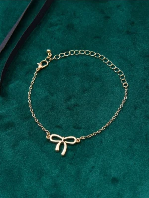 Sinsay - Bransoletka z zawieszką w kształcie kokardy - złoty