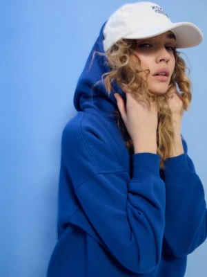 Zdjęcie produktu Sinsay - Dresowa bluza hoodie z nadrukiem "Le Soleil" - niebieski