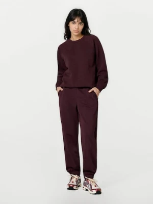 Sinsay - Dresowe spodnie jogger terry - czerwony