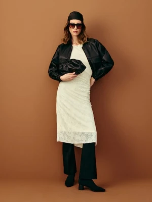 Sinsay - Dzianinowe spodnie flare z przeszyciami - czarny