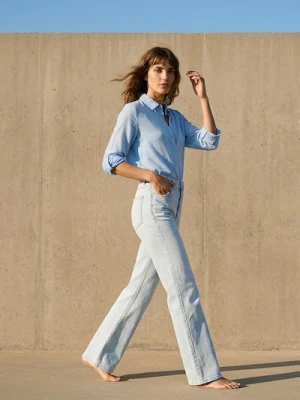 Sinsay - Jeansy flare z efektem sprania - niebieski