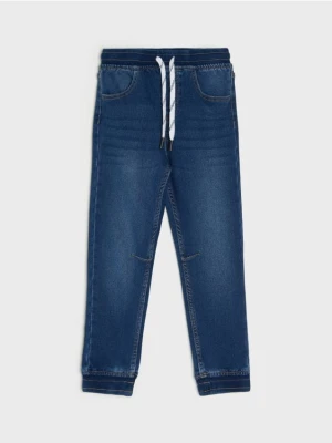 Sinsay - Jeansy jogger z efektem sprania - granatowy
