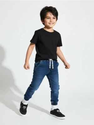 Sinsay - Jeansy jogger z efektem sprania - granatowy